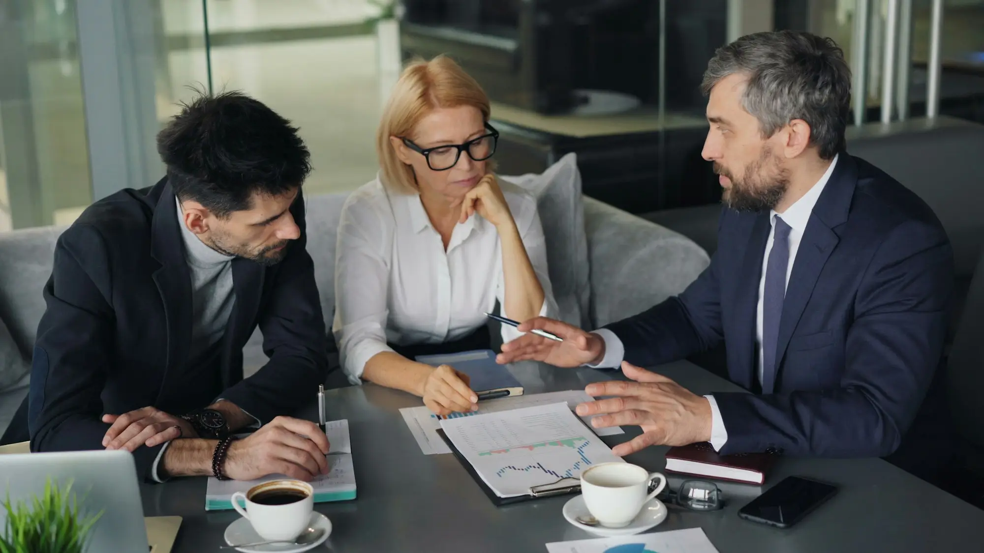 Accountant meeting clients for an end of financial year review